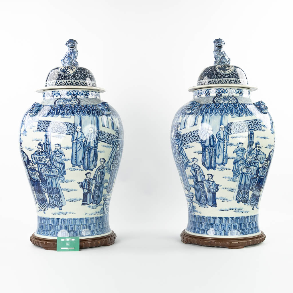 A pair of large Chinese vases with lid, made of blue-white porcelain with the emperor, dragons and w - Image 6 of 15