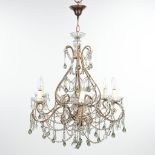 A decorativeÊchandelier made of brass and glass. (H:70cm)