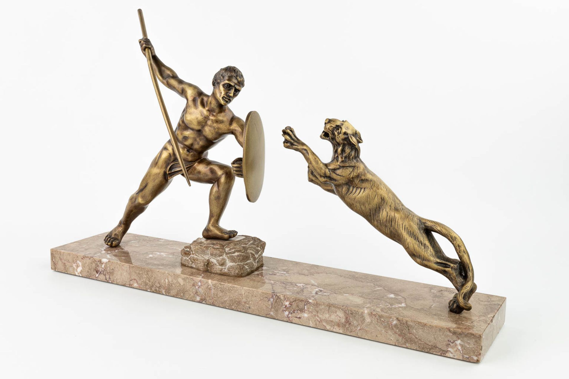 R. TUBACK (XIX-XX) 'Hunter with lion' an art deco statue made of bronze and mounted on a marble base - Image 3 of 11