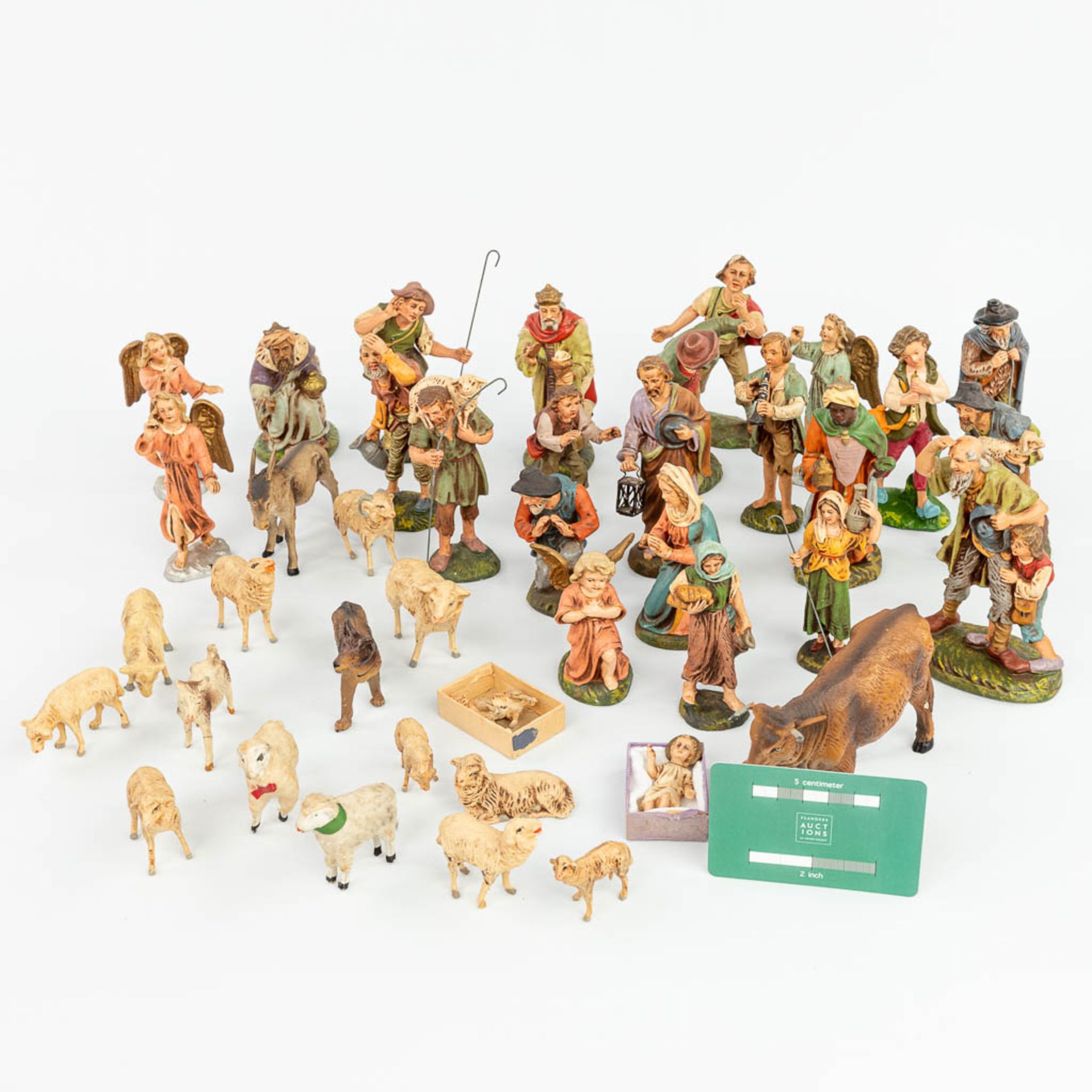 A large and extended Nativity scene with figurines and animals made of papier maché. - Image 2 of 20