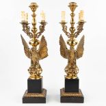 A pair of table lamps in the shape of an eagle made of gilt bronze in Hollywood Regency style. (H:71