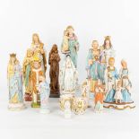 A large collection of 16 coloured bisque statues of holy figurines. (H:44cm)