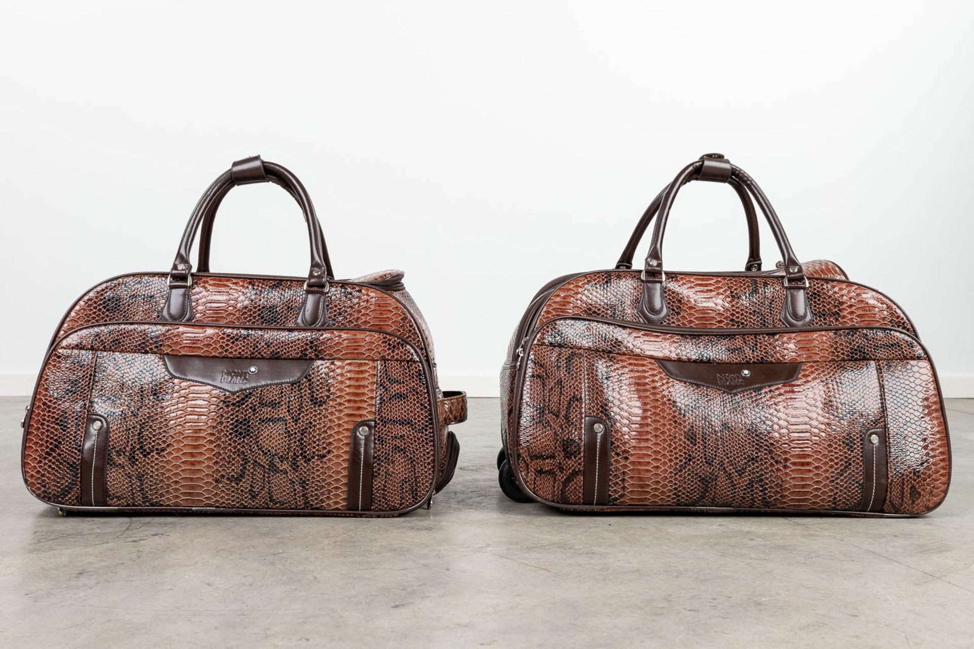 A set of 2 travel bags made of leather by Montblanc. (H:34cm) - Image 6 of 19