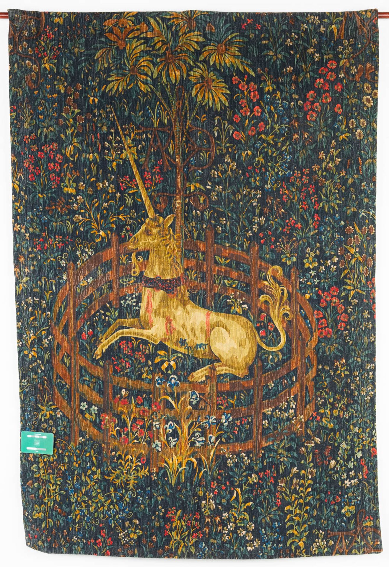 A tapestry with a printed image of a unicorn in a flower field. (H:136cm) - Image 6 of 6