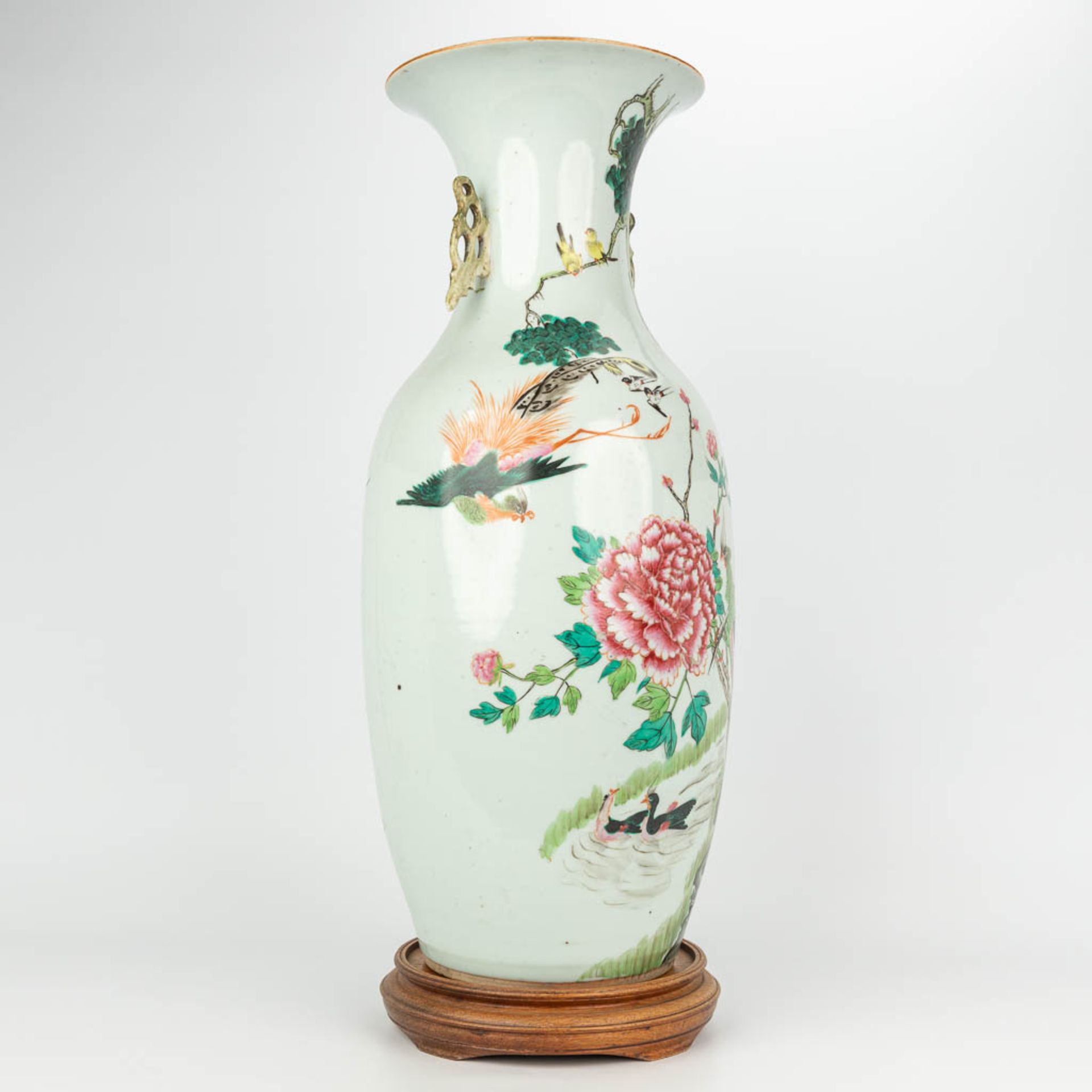 A Chinese vase made of porcelain, Famille rose and decorated with fauna and flora. (H:57cm) - Image 3 of 17