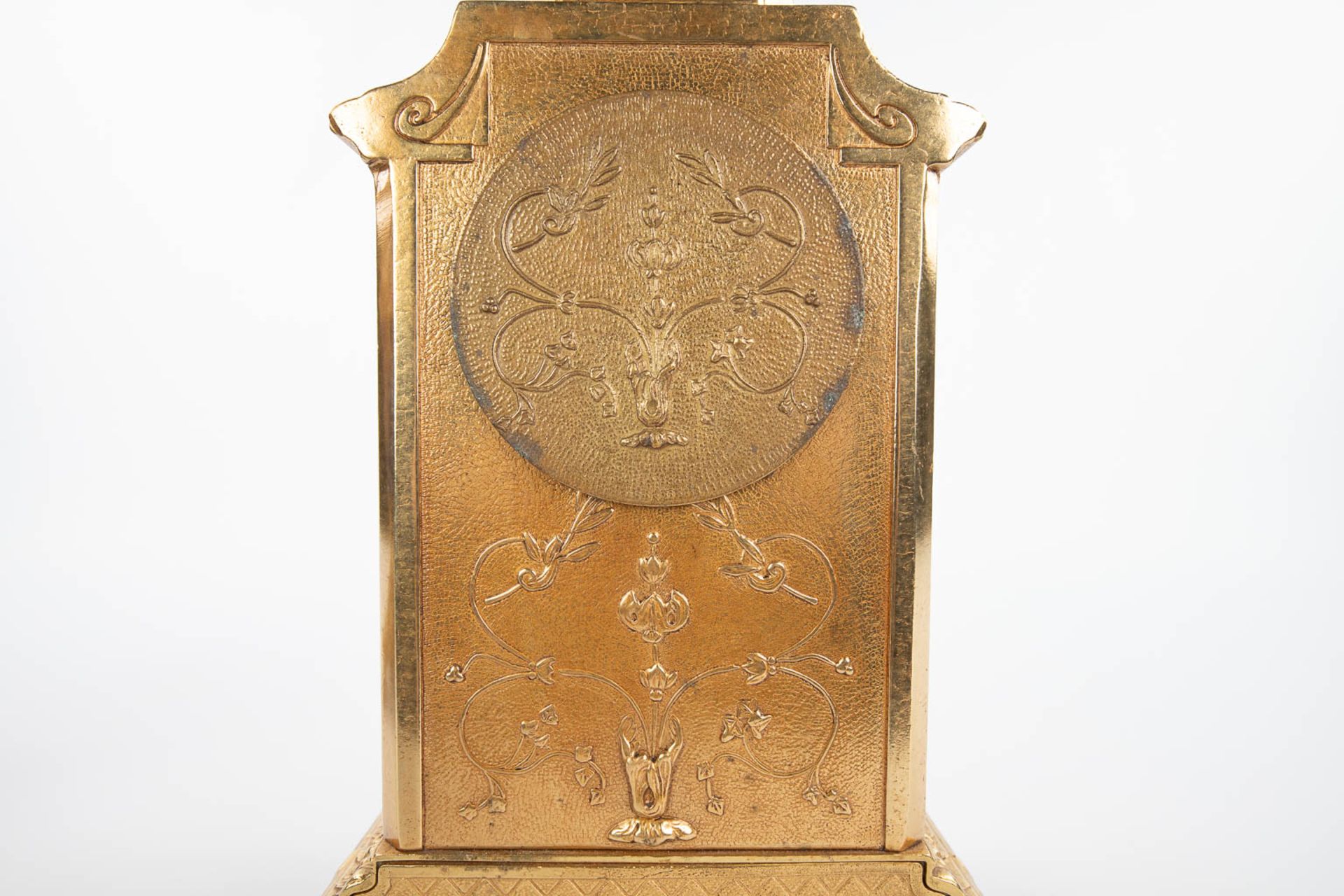 A three-piece mantle garniture clock made of bronze and porcelain and marked Imperial. (H:43cm) - Image 10 of 12