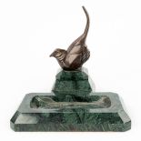A 'Vide Poche' made of marble with a bird made of bronze in art deco style.