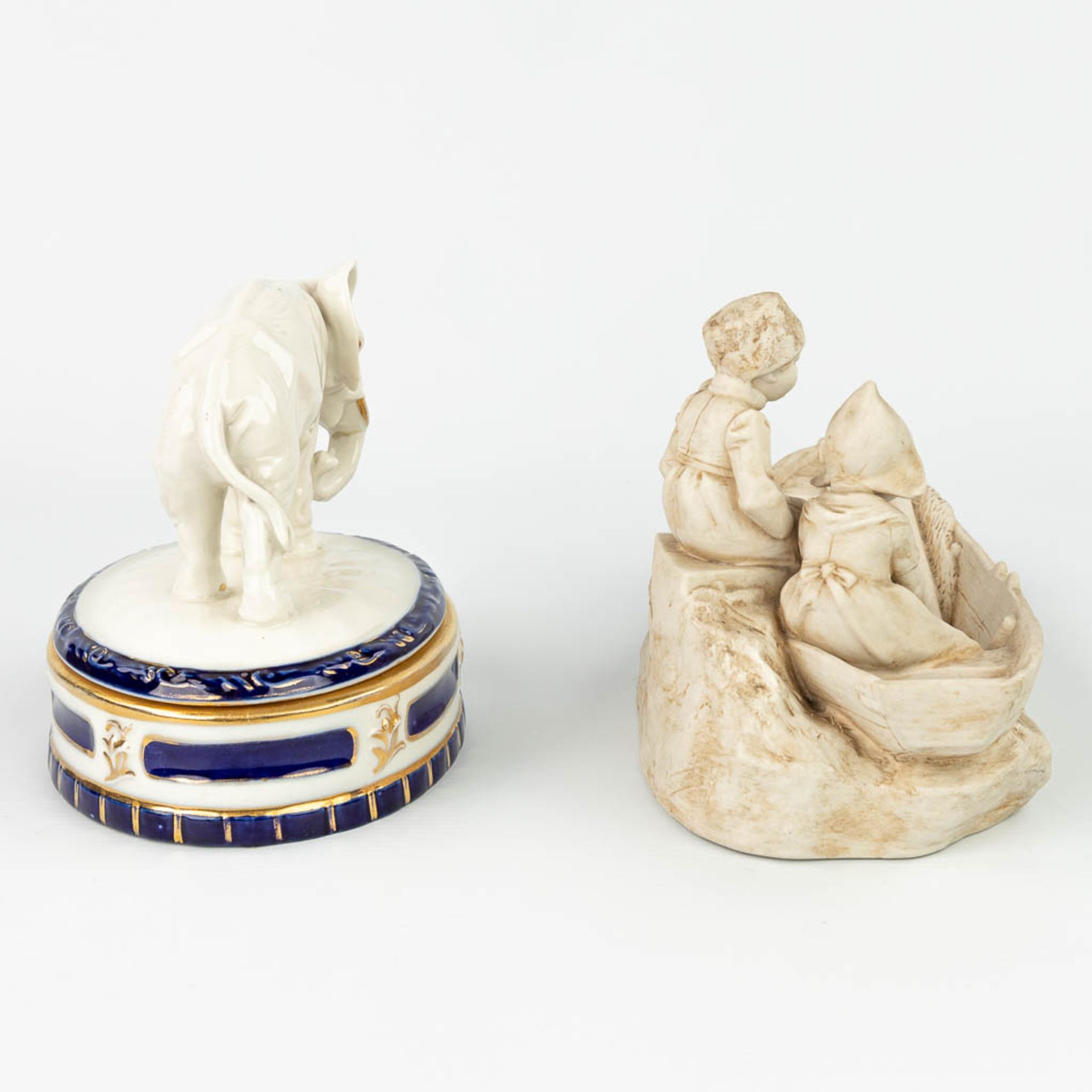 A collection of 2 pieces of Royal Dux porcelain: 'Boys in a boat - Bonbonire with an elephant'. (H: - Image 5 of 13