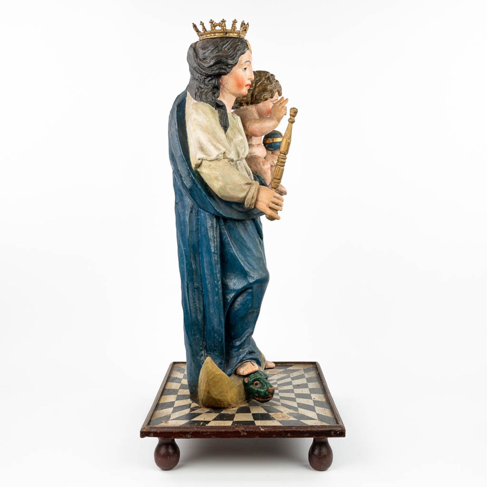 A patinated wood statue of Madonna with a child, standing on the serpent and half-moon. - Image 2 of 18
