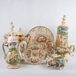 An assembled lot of 9 pieces of faience made by Capodimonte in Italy. (H:60cm)