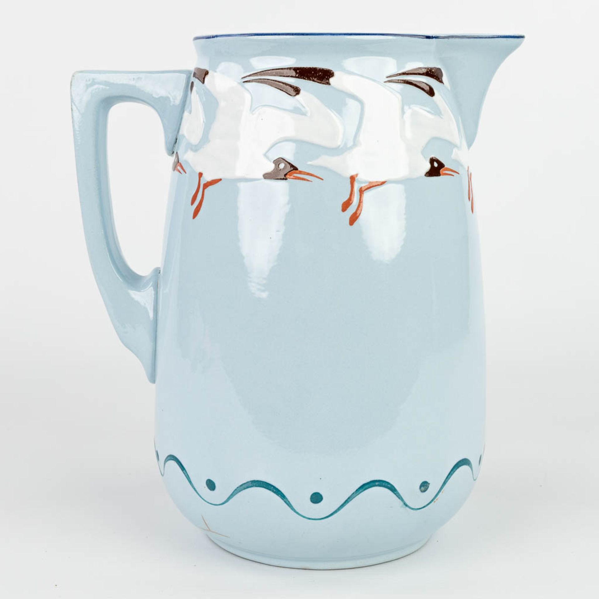 A jug and bowl made in art nouveau style with blue glaze and decorated with seagulls. Marked Sarregu - Image 5 of 20