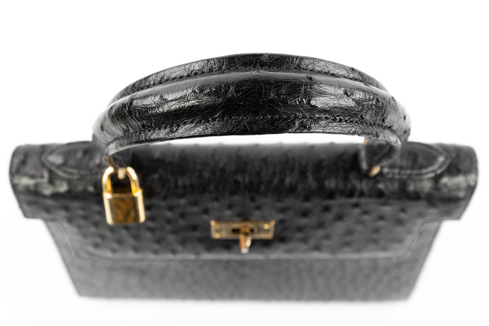 A handbag made of black ostrich leather and made by Olivier Gurtner in Switzerland. (H:28cm) - Image 12 of 17