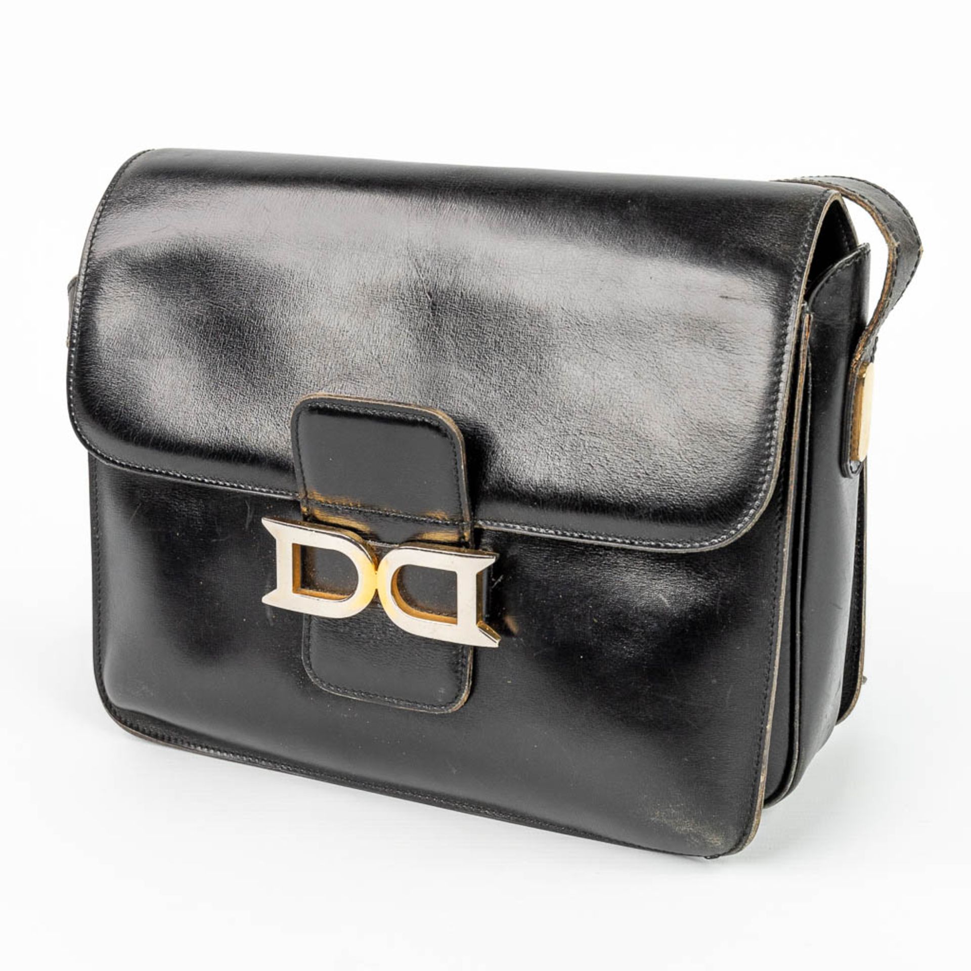 A purse made of black leather and marked Delvaux. (H:21cm) - Image 2 of 11