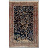 An antique hand-made carpet 'Ghom', made in Iran.Ê324cm x 207cm. (207 x 324 cm)