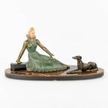 Salvatore MELANI (1902-1934) 'Lady with greyhound' an art deco statue made of spelter. (H:31cm)