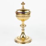 A ciboria made of gold-plated silver and marked VF800. (H:26,5cm)