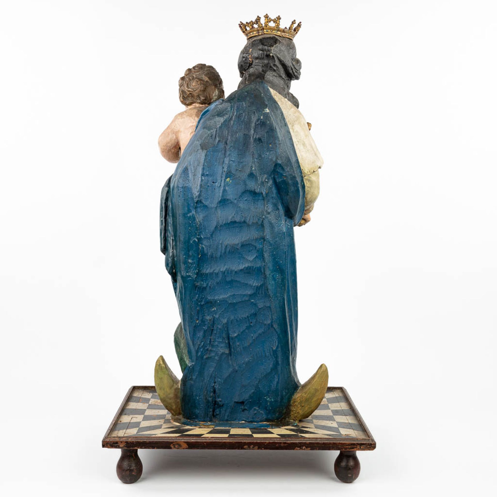 A patinated wood statue of Madonna with a child, standing on the serpent and half-moon. - Image 5 of 18