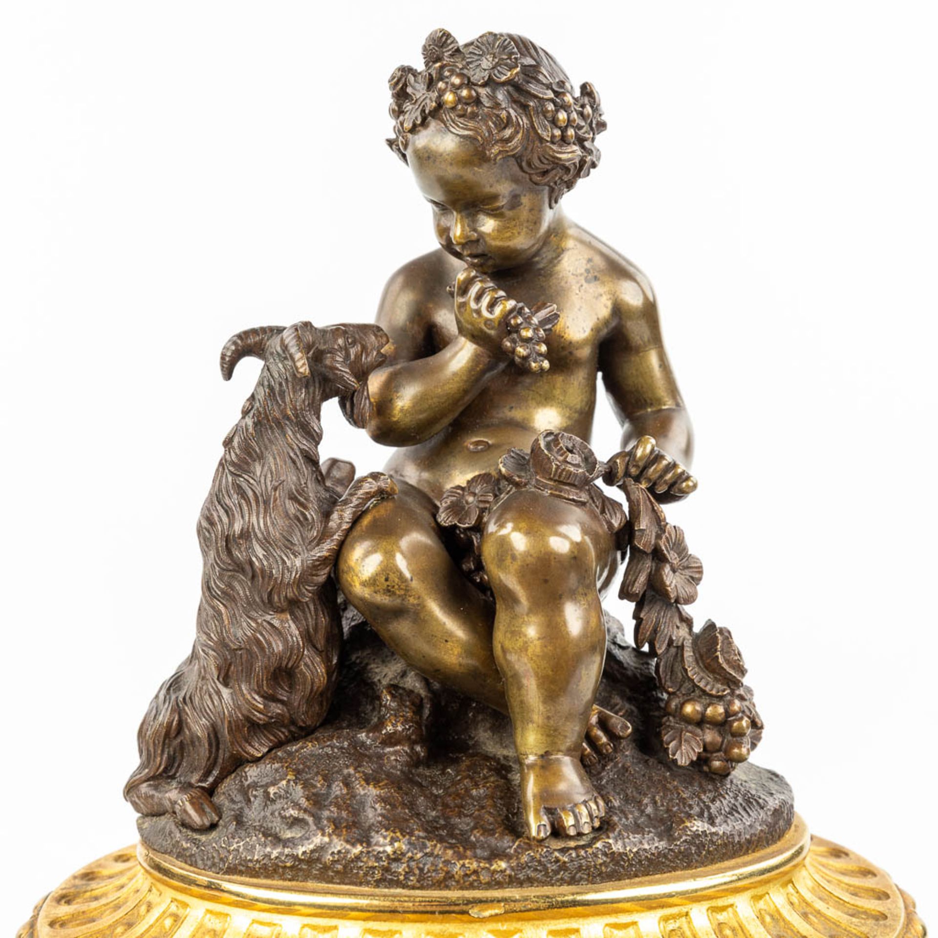 A clock made of marble and decorated with gilt and patinated bronze in Louis XVI style. (H:42cm) - Image 6 of 12