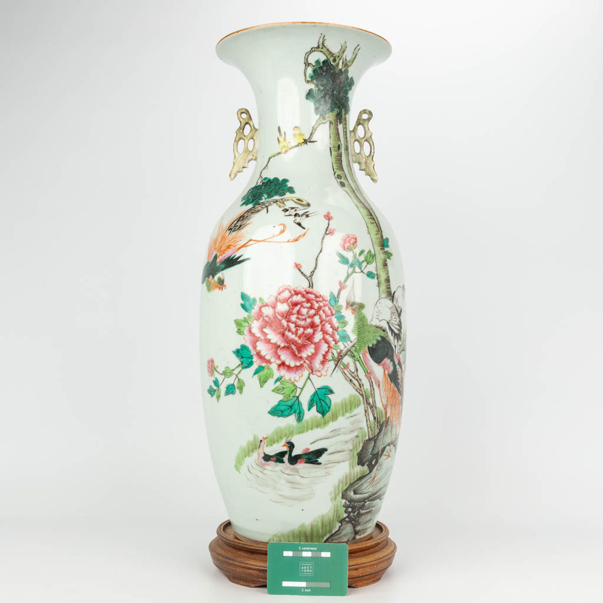A Chinese vase made of porcelain, Famille rose and decorated with fauna and flora. (H:57cm) - Image 4 of 17