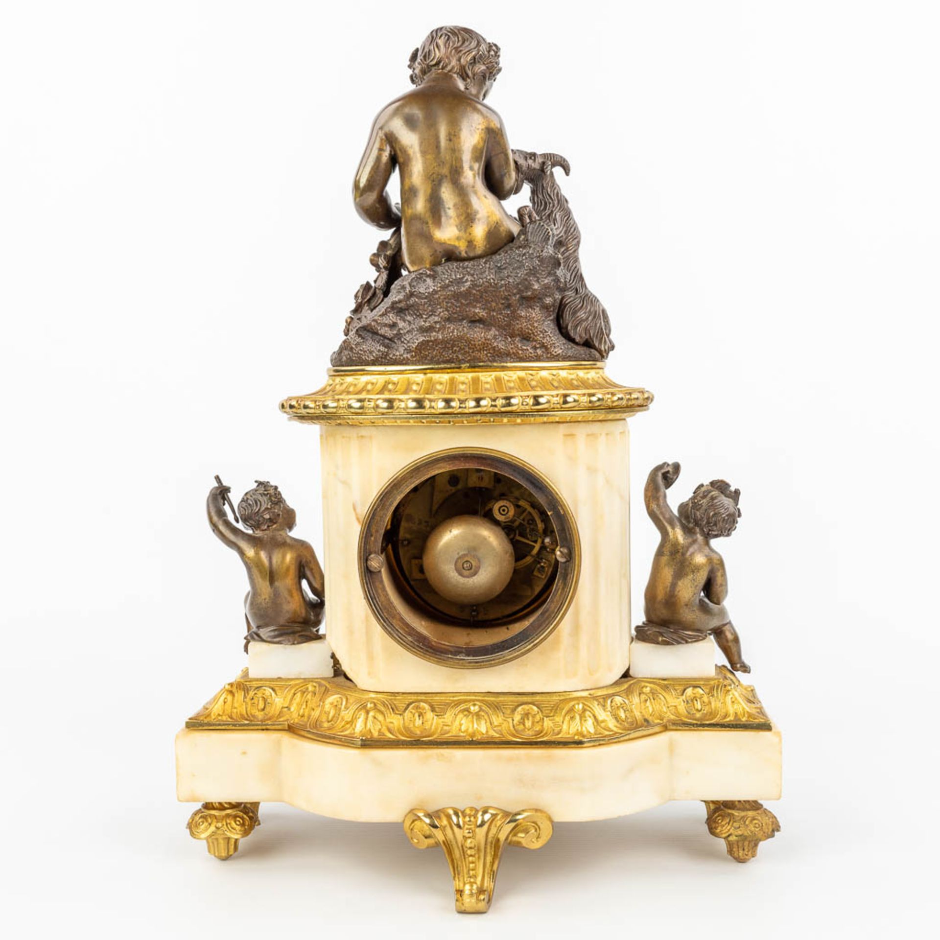 A clock made of marble and decorated with gilt and patinated bronze in Louis XVI style. (H:42cm) - Image 5 of 12