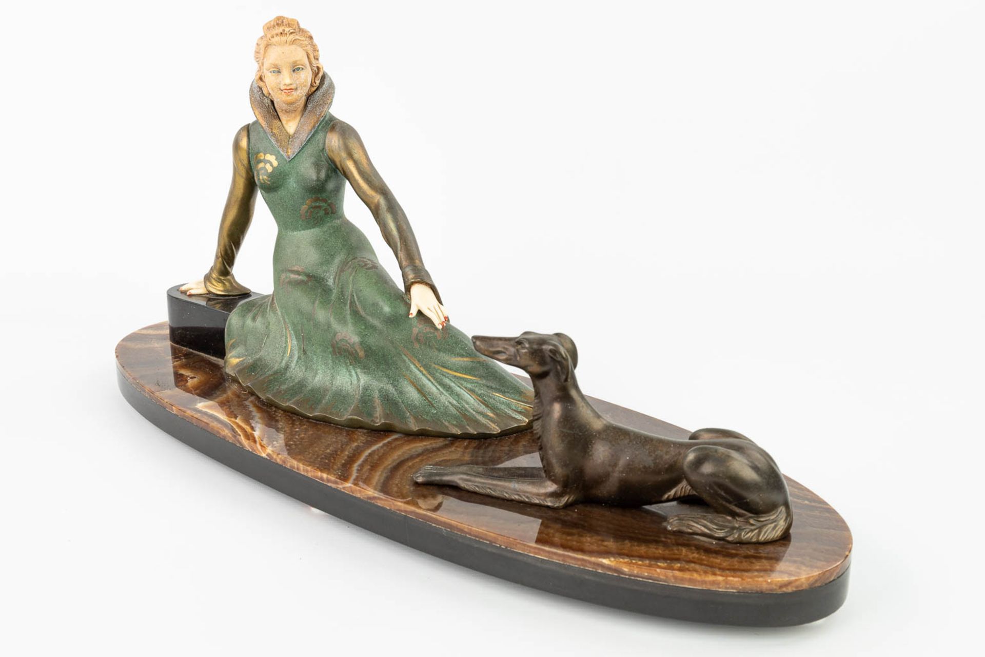 Salvatore MELANI (1902-1934) 'Lady with greyhound' an art deco statue made of spelter. (H:31cm) - Image 4 of 12