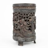 An ajoured vase made of sculptured hardwood with a dragon and foo dog. (H:20,5cm)