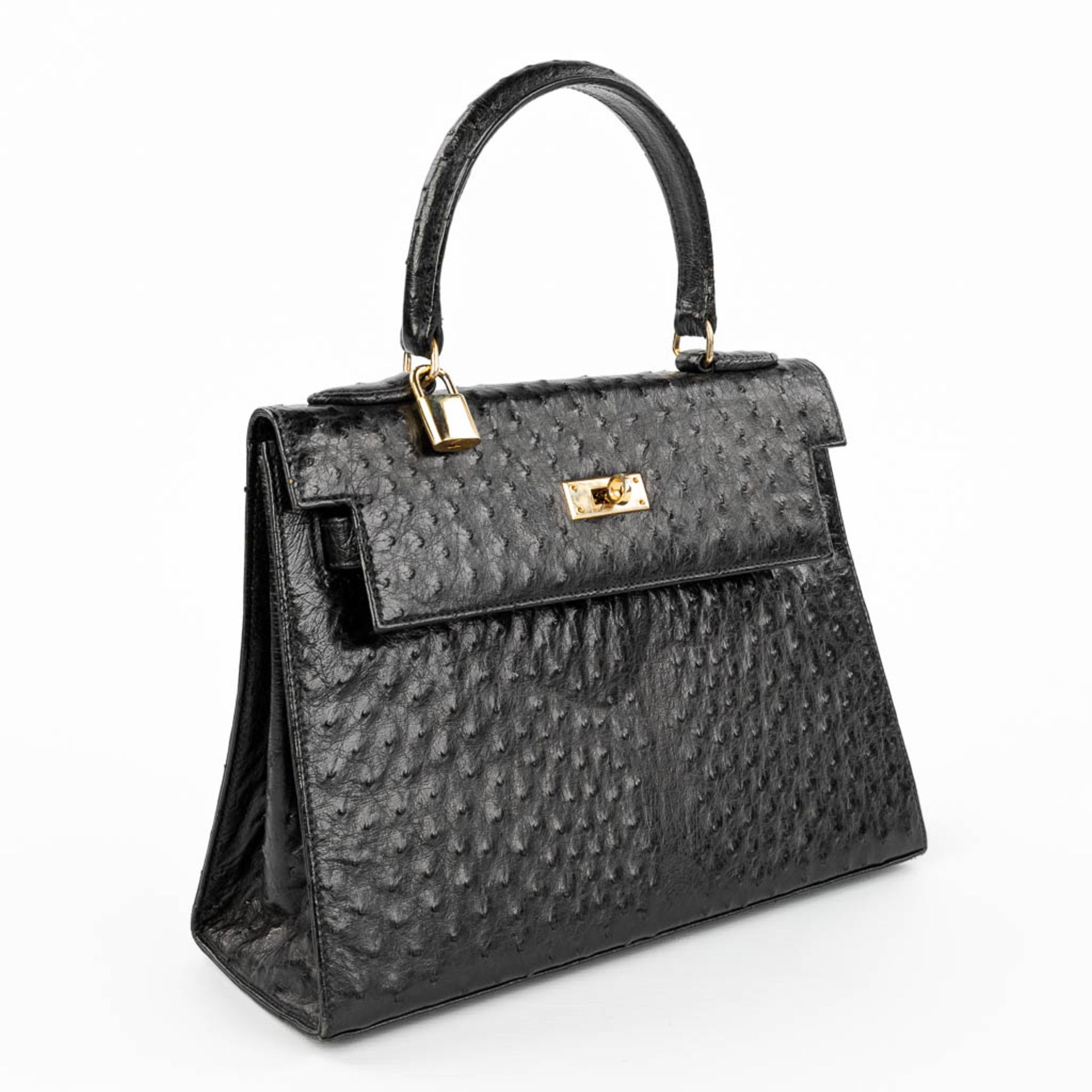 A handbag made of black ostrich leather and made by Olivier Gurtner in Switzerland. (H:28cm)