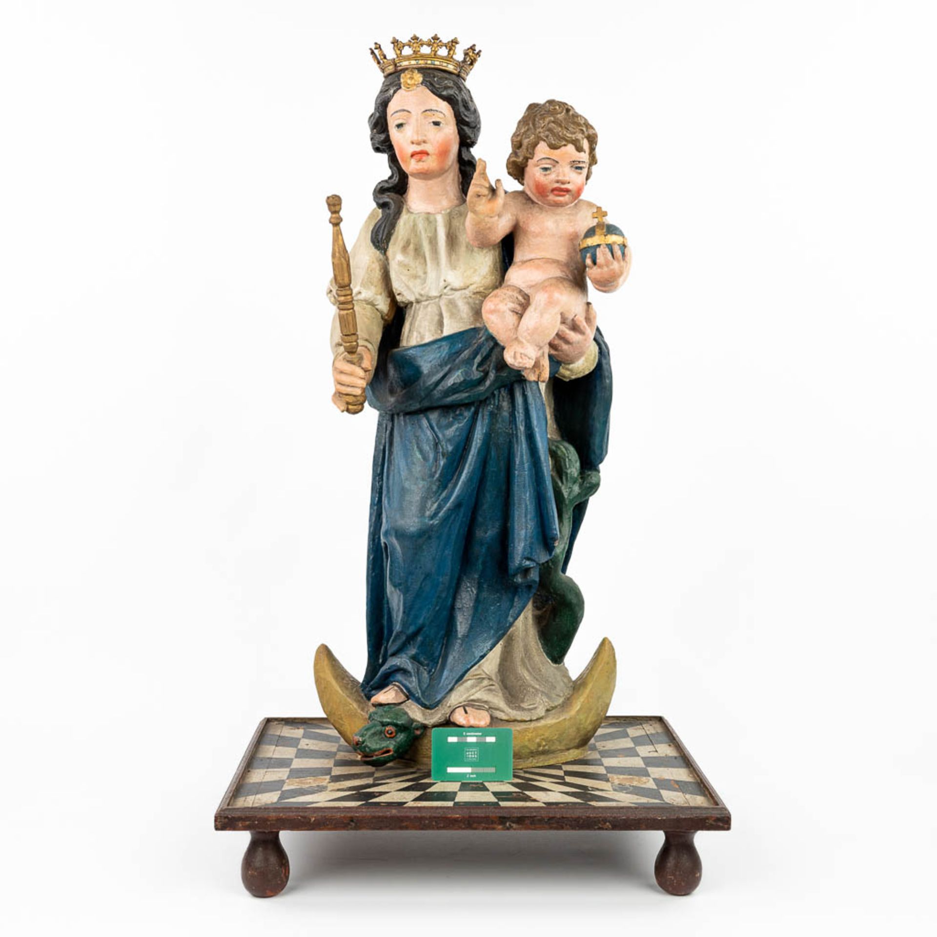A patinated wood statue of Madonna with a child, standing on the serpent and half-moon. - Image 7 of 18