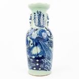 A Chinese vase with a blue-white decor of fauna and flora. (H:60cm)