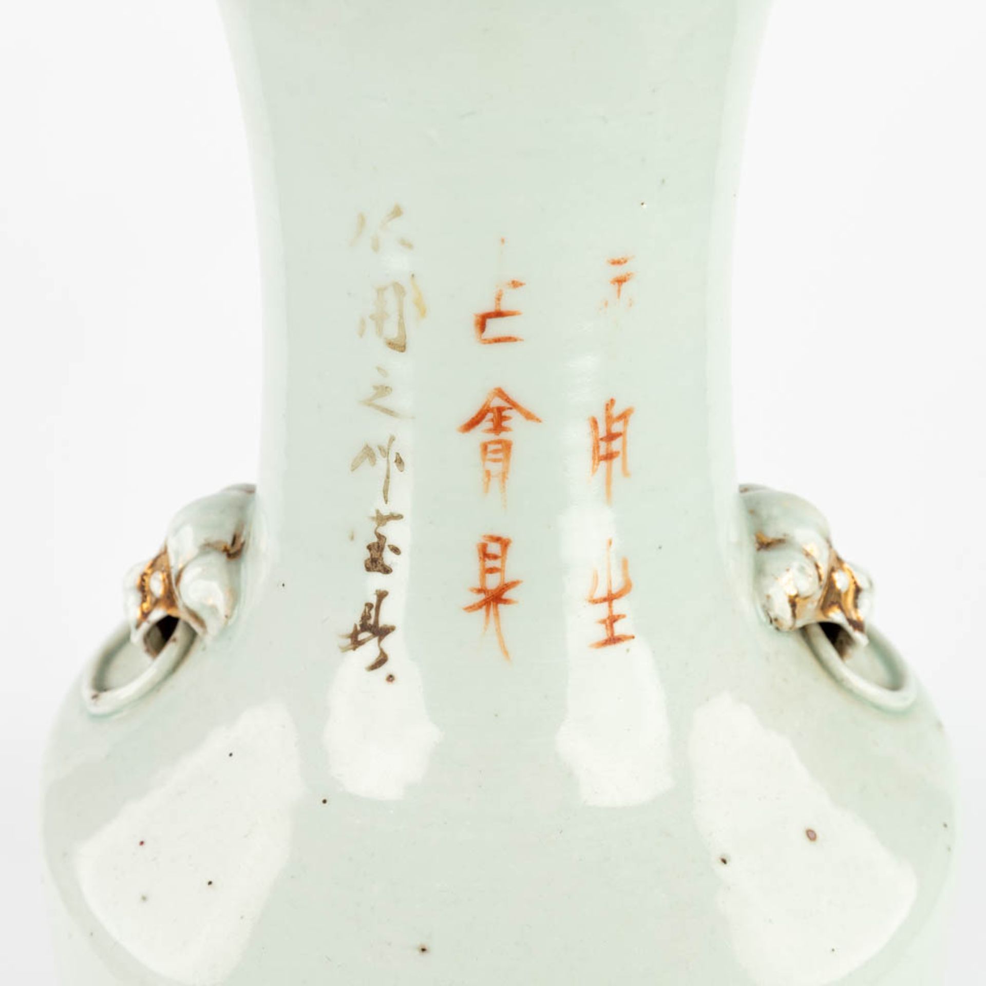 A Chinese vase made of porcelain decorated with ladies at a table. (H:57,5cm) - Image 3 of 14