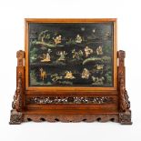A Chinese sculptured table screen with images of the 8 immortals, cranes, deer and pine trees. (H:80