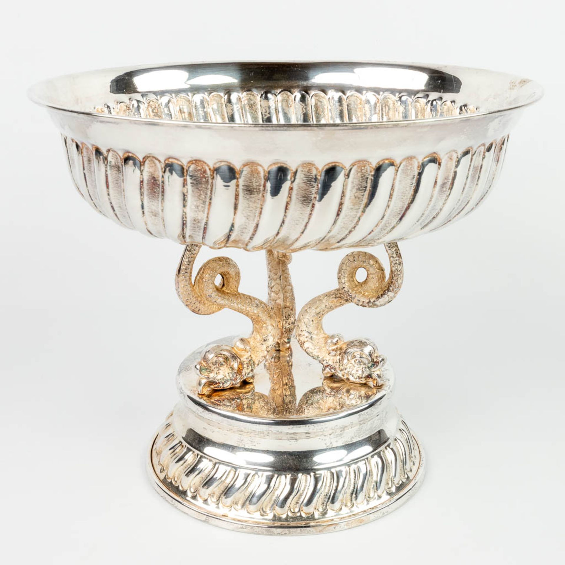 A tazza made of silver-plated metal and decorated with fish figurines. 20th century, not stamped. 15