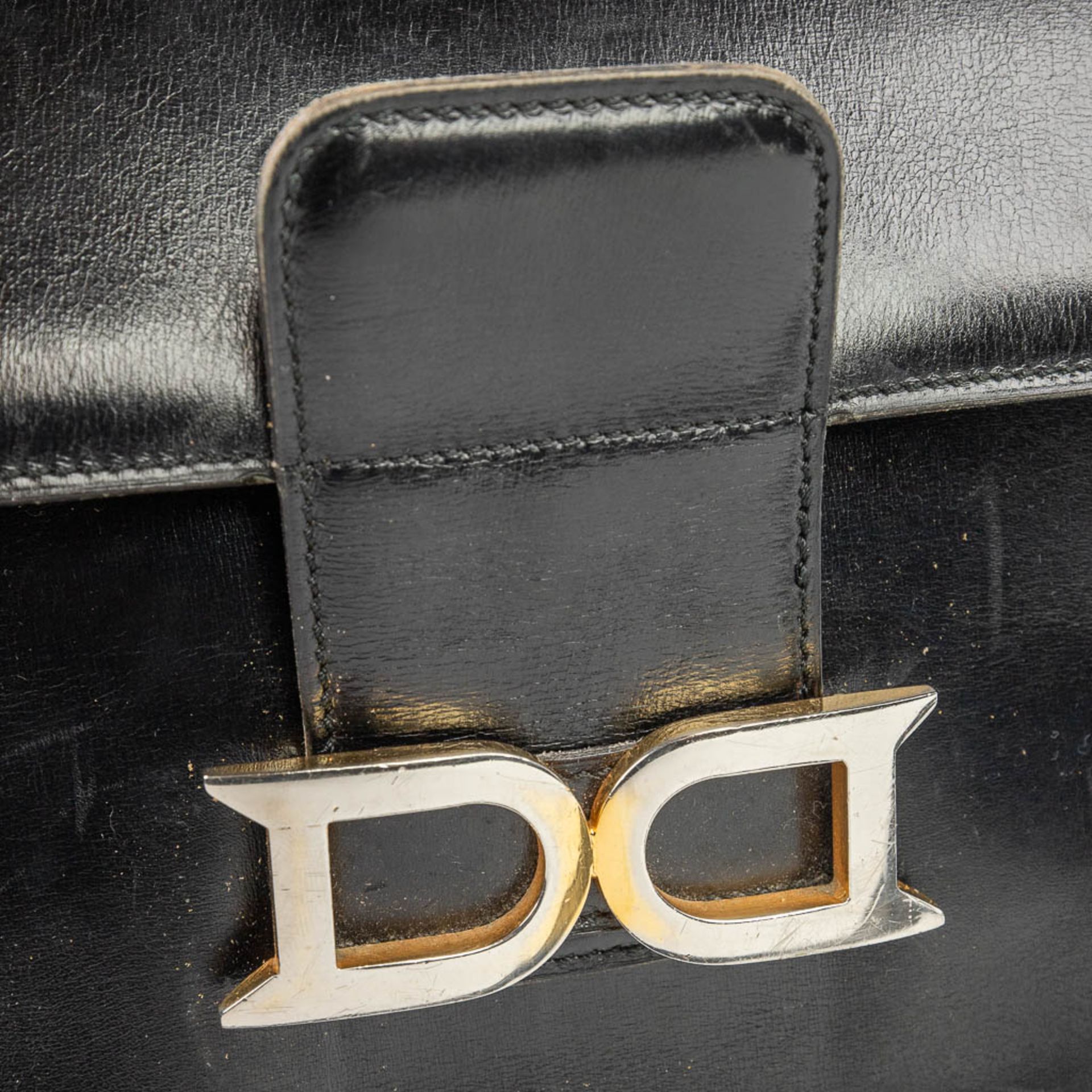 A purse made of black leather and marked Delvaux. (H:21cm) - Image 10 of 11