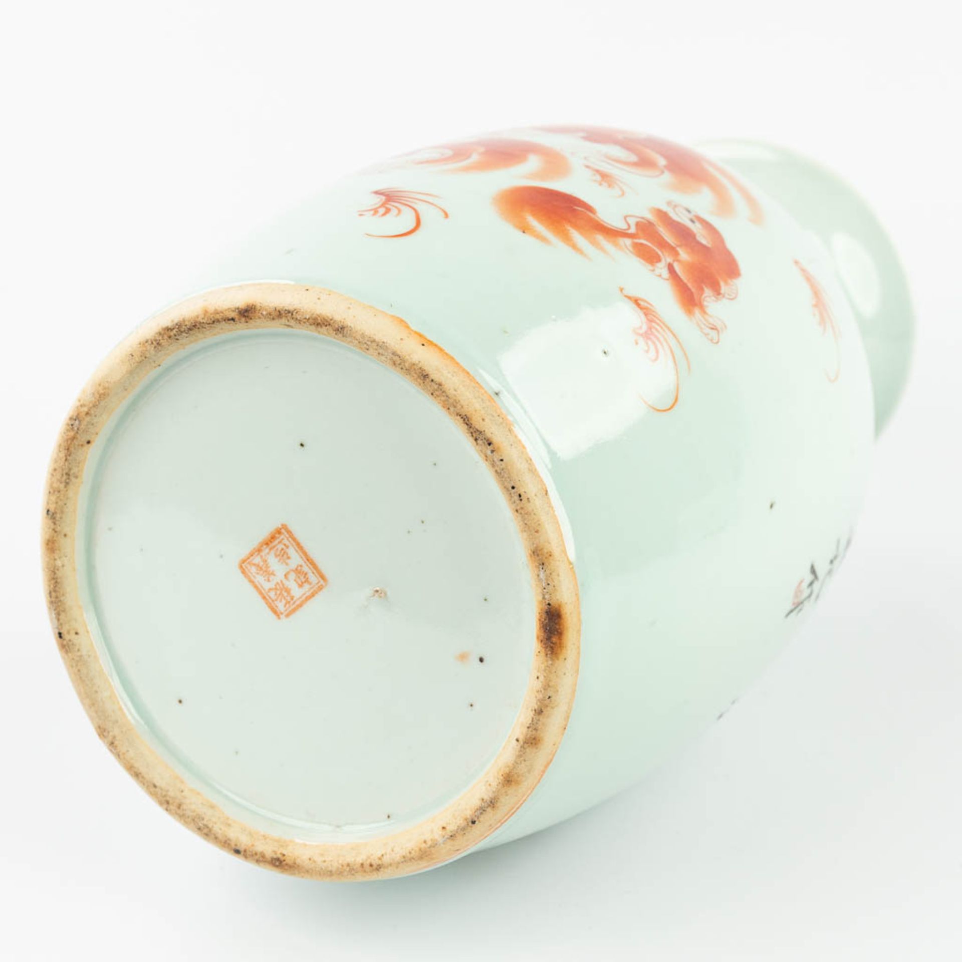 A Chinese vase made of porcelain and decorated with a red foo dog. (44,5 x 21 cm) - Image 9 of 16