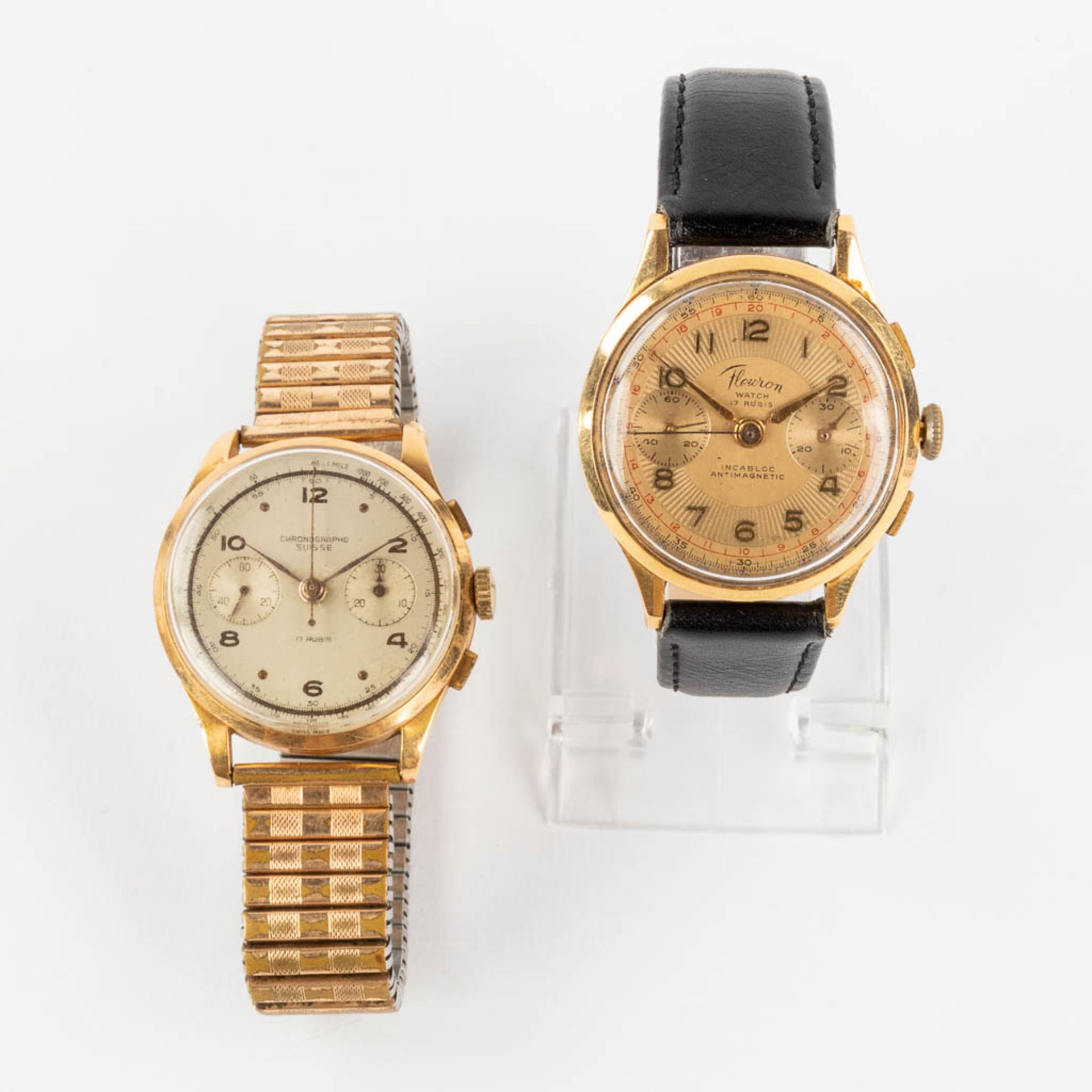 A collection of 2 wristwatches 'Fleuron' and 'Chronographe suisse', 18kt gold. (3,8cm)