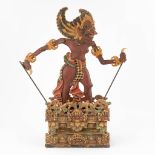 A wood sculptured 'Barong Dancer', Java, Bali. (30 x 64 cm)