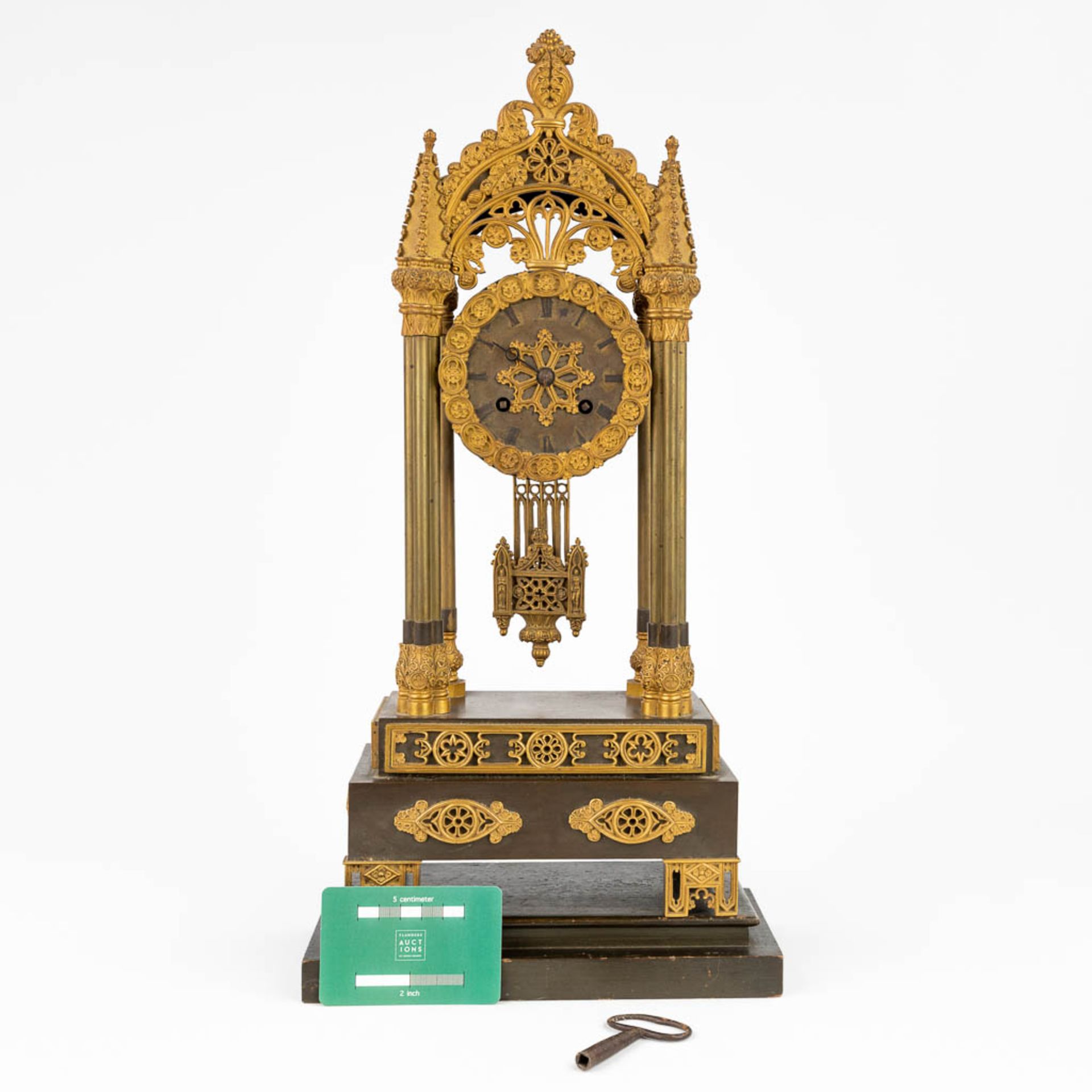 A table column clock made of gilt bronze in a gothic revival style. (11 x 19,5 x 43cm) - Image 5 of 15