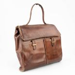 Delvaux, a briefcase made of brown leather. (7 x 35 x 33cm)