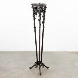 A wrought iron stand with Portoro marble, circa 1920. (37 x 37 x 126cm)