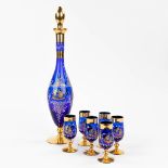 A carafe with a stopper and 6 glasses, made of blue and gold glass (41,5cm)