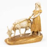 Royal Dux, 'Lady With the Goat' a statue made of faience (12 x 29 x 28cm)