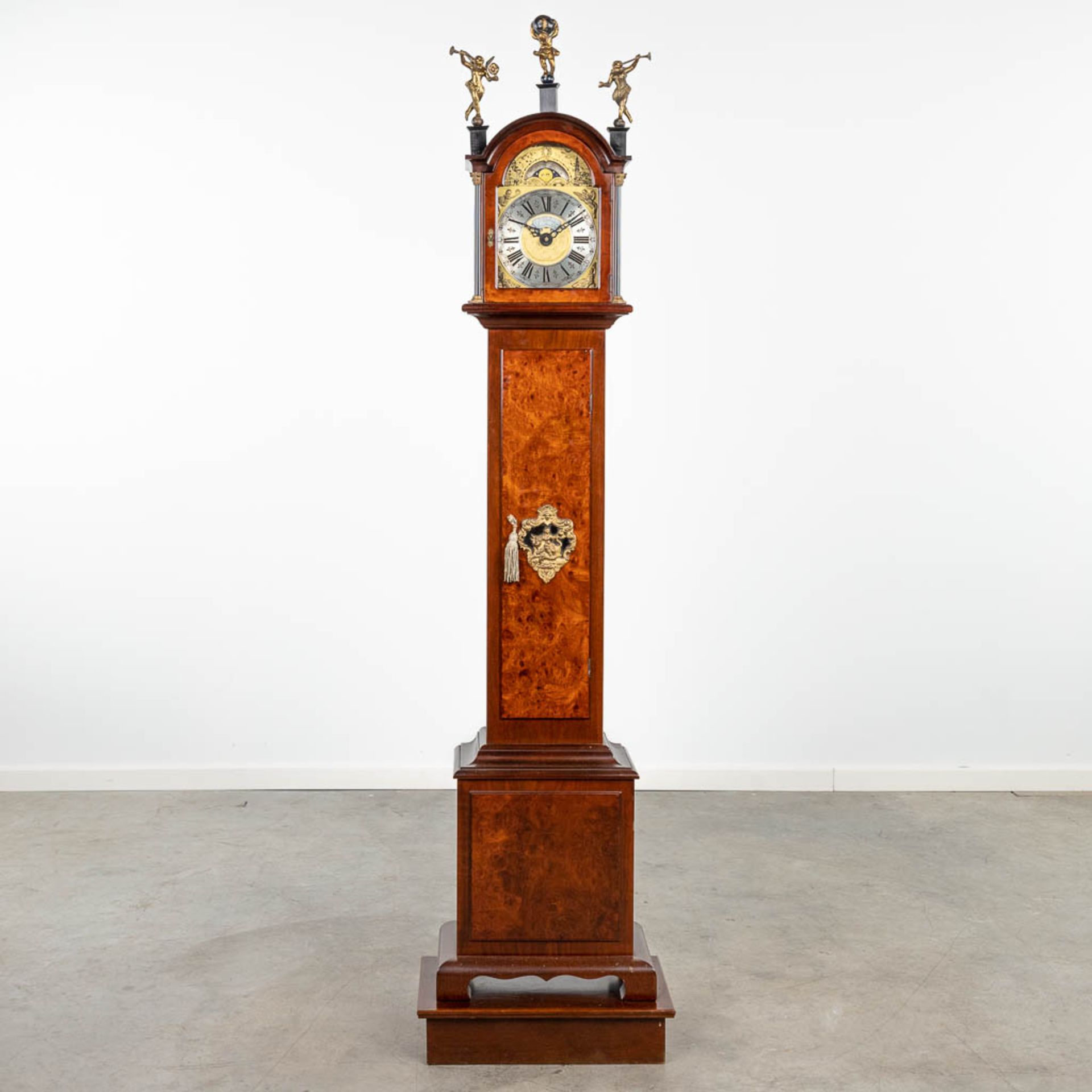 A standing clock, marked J.M. Verbrugge, Amsterdam. (28 x 47 x 192cm)