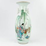 A Chinese vase decorated with a hand-painted decor of ladies. (56,5 x 24 cm)