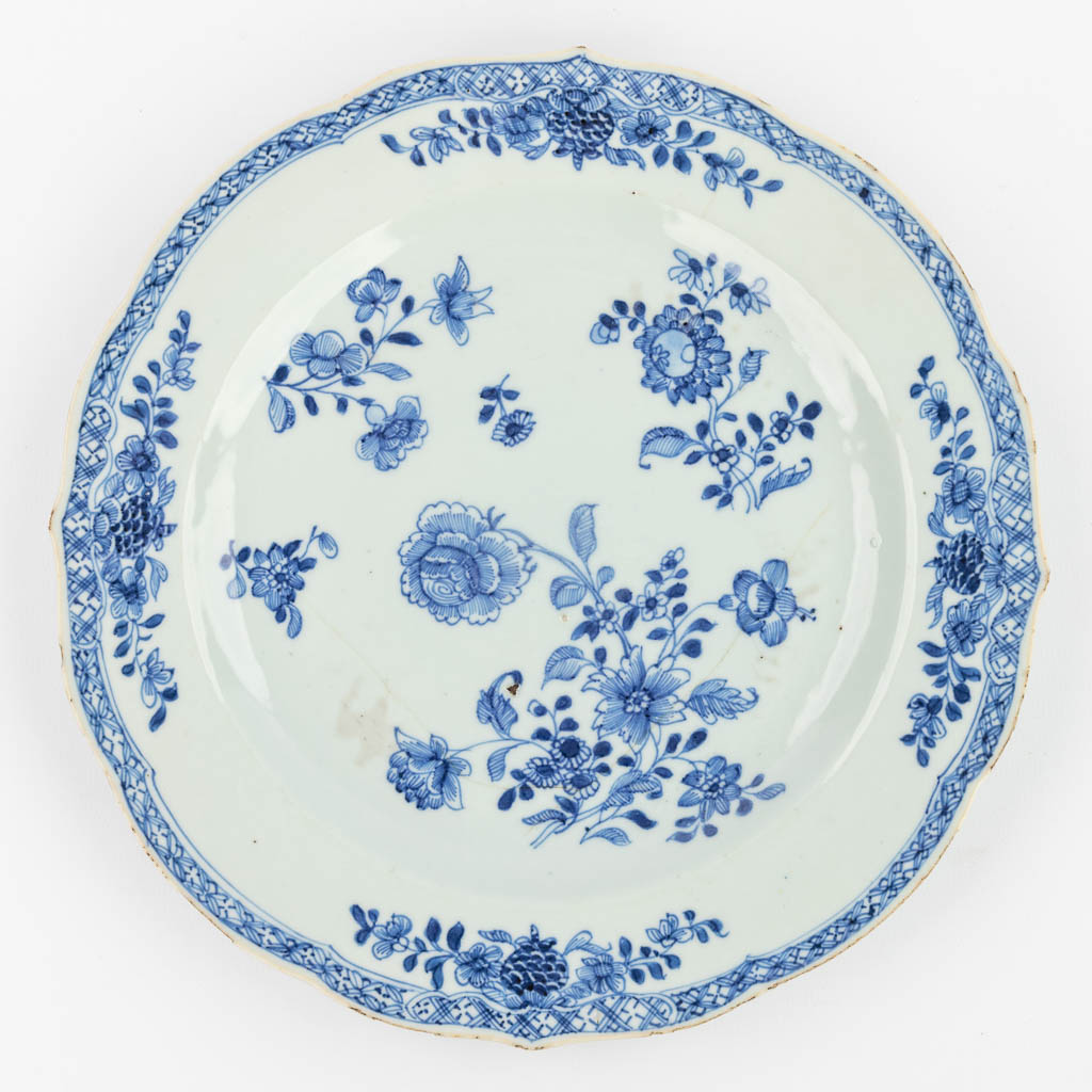 A collection of 7 Chinese plates with blue-white decor. (23 cm) - Image 11 of 18