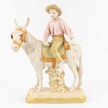 Royal Dux 'Donkey Rider' a statue made of glazed faience (16 x 28 x 37cm)