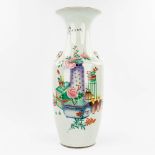 A Chinese vase made of porcelain and decorated with bonsai trees, peonies and antiquities. (59 x 23