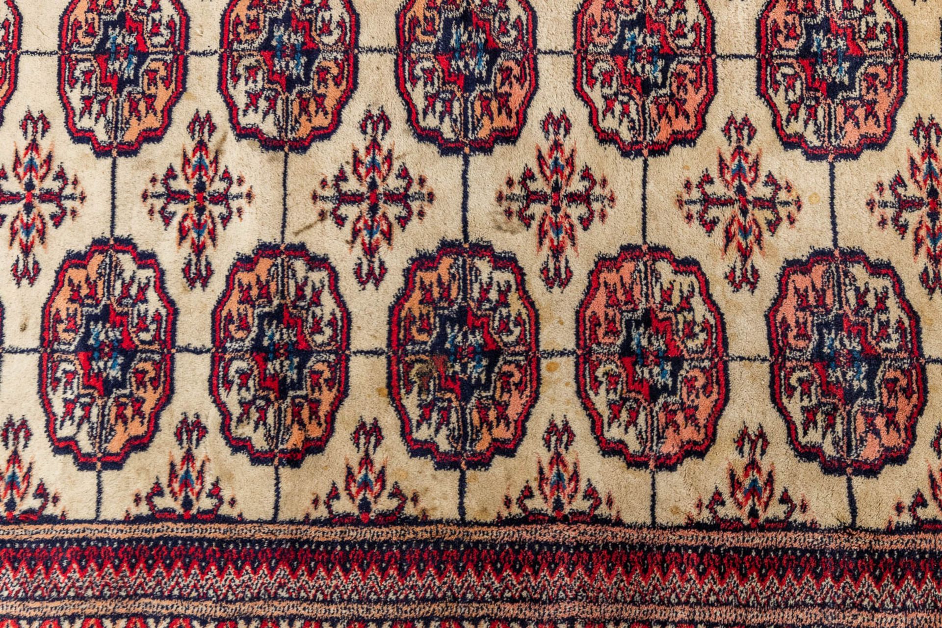 An Oriental hand-made carpet, Bokhara. (340 x 260 cm) - Image 3 of 9