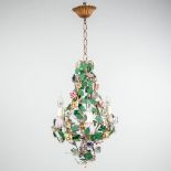 A mid-C. chandelier made of metal and finished with porcelain flowers. (55 x 30cm)