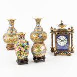 A collection of 4 vases and a small table clock, made of cloisonnŽ bronze. (8 x 14 x 19,5 cm)
