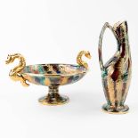 A tazza and pitcher made of glazed faience and marked Becquet. (32 x 43 x 22cm)